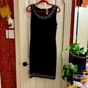 Little embellished black dress.